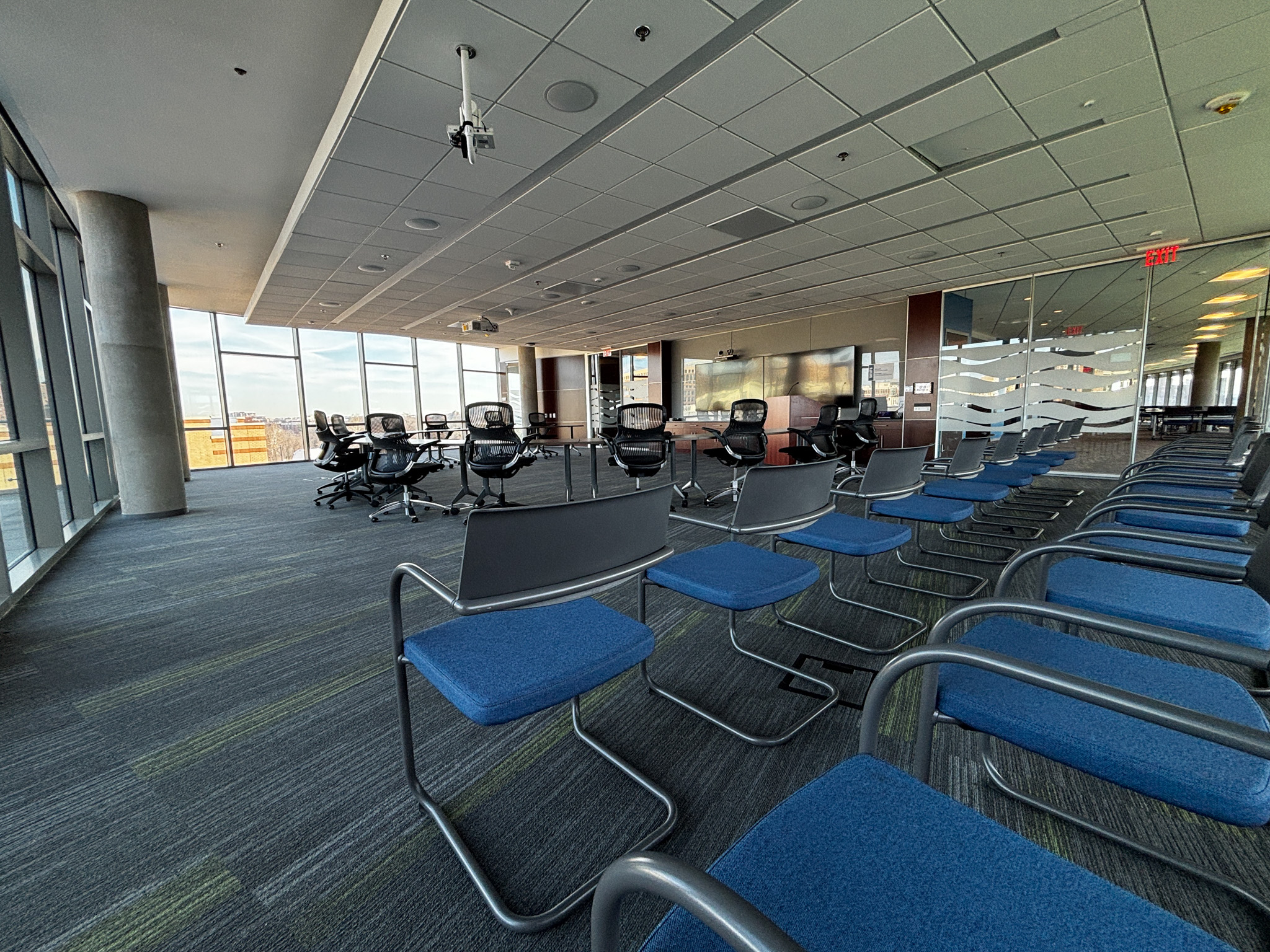 conference room space with blue chairs.