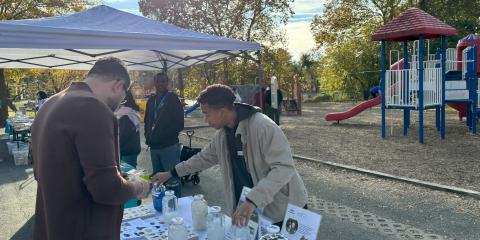 Alex at community event